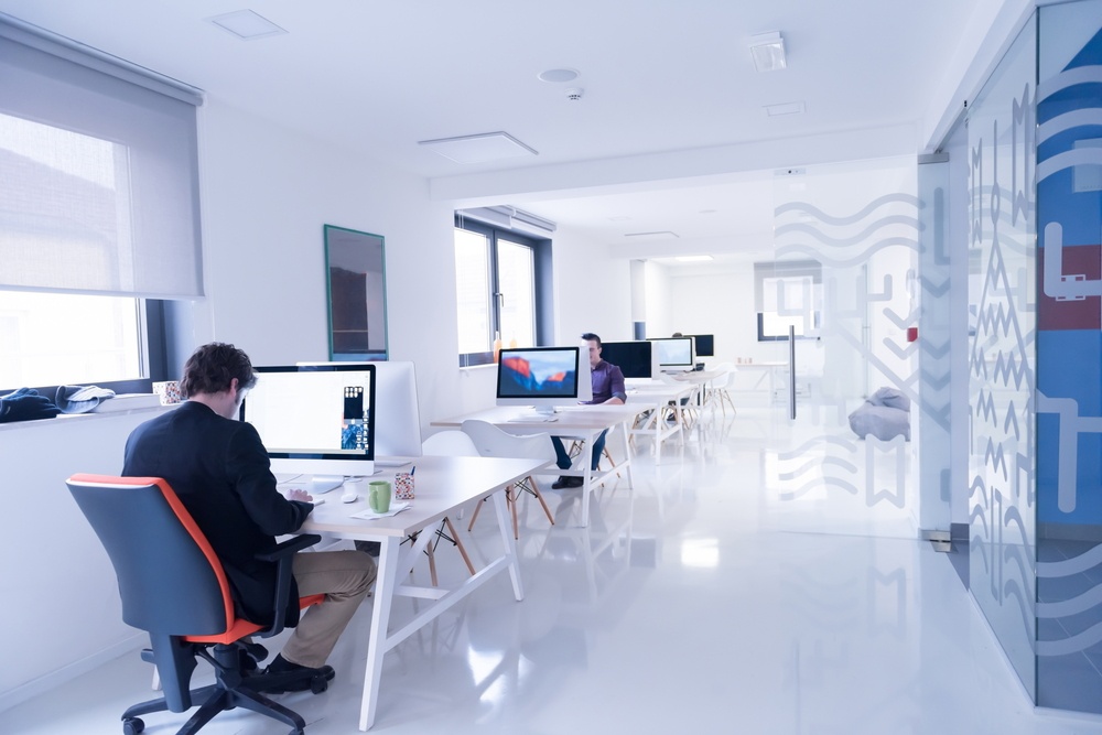 startup business, software developer working on computer at modern office.jpeg